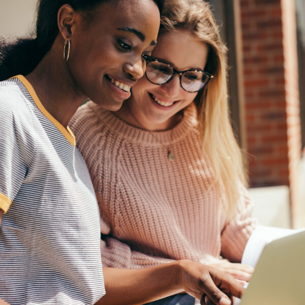 Two young girls with a laptop