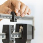 Hand adjusting weight scales