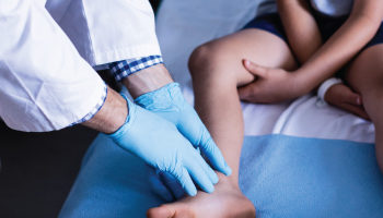 Male doctor examining patient