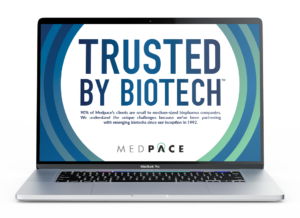 Trusted by Biotech brochure pulled up on a MacBook
