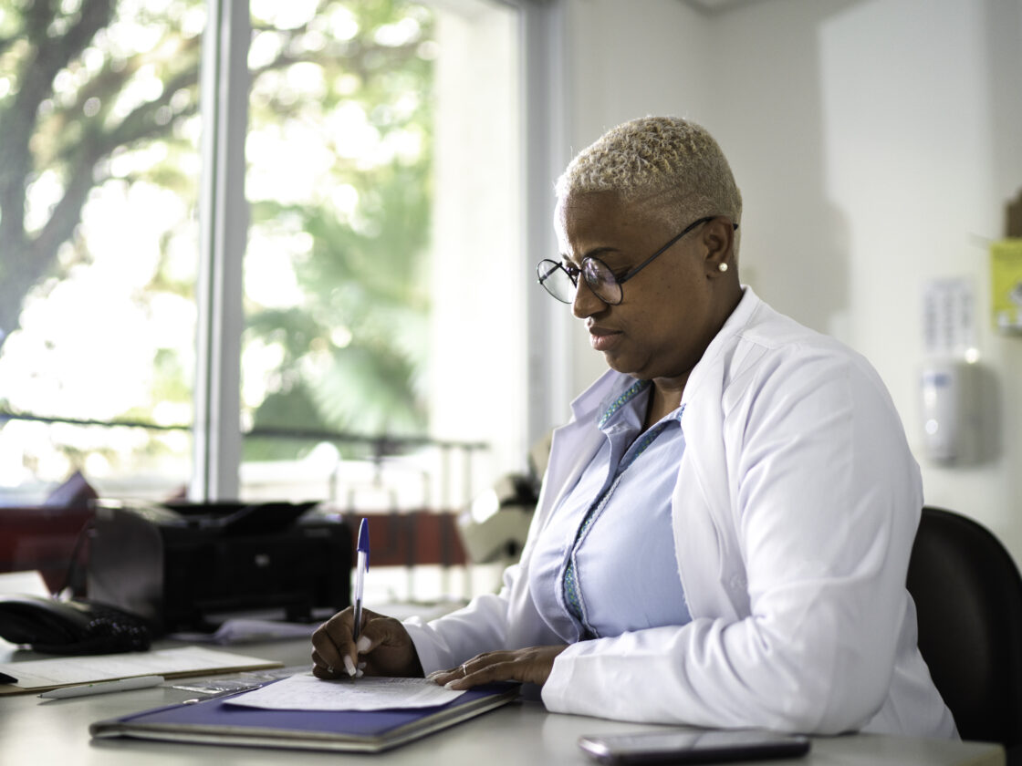 doctor working at her office