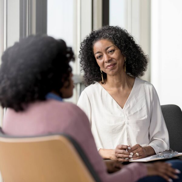 counselor listening to her female client