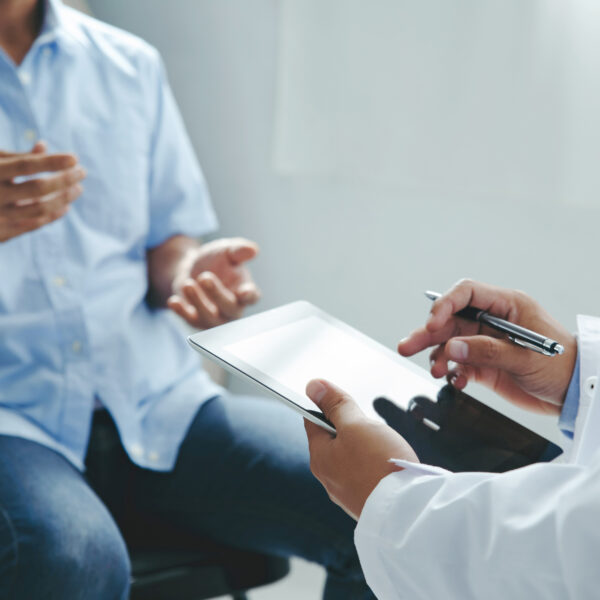 Doctor talking to patients