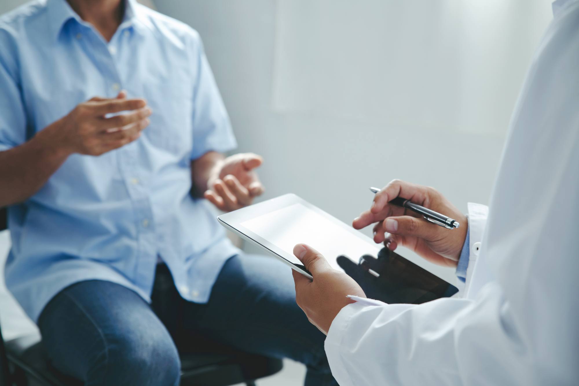 Doctor talking to patients