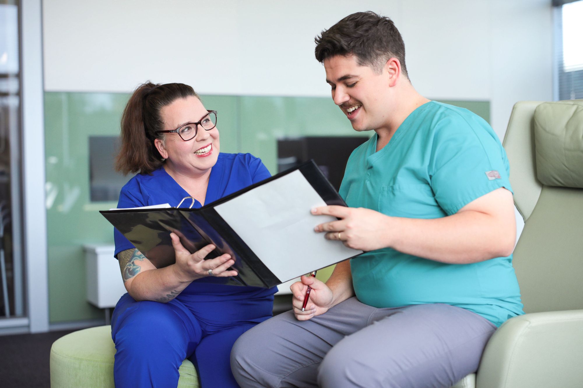 nurses working inside binder