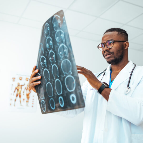 Doctors Examining X-Ray