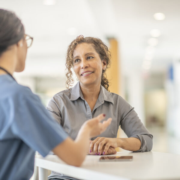 Woman meets with her female physician