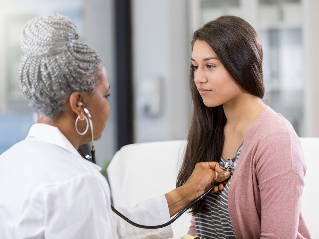 Women's health CRO doctor and patient