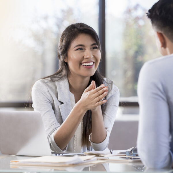 businesswoman meets with a male colleague