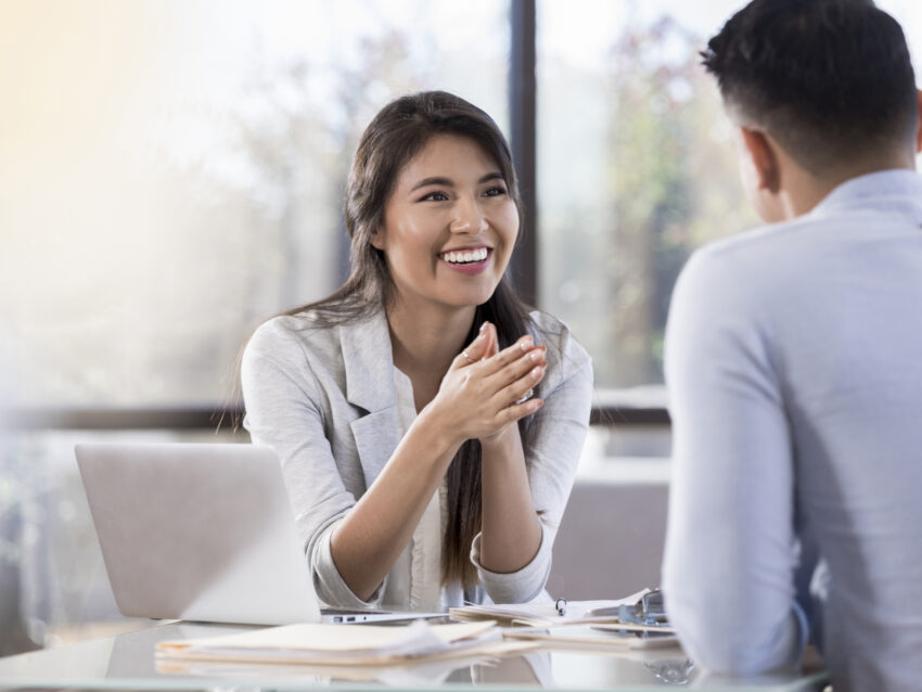 businesswoman meets with a male colleague