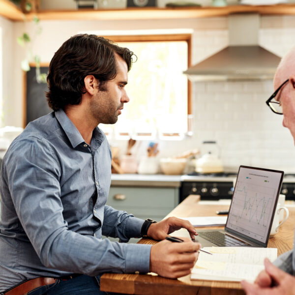 businessman sitting with his senior client