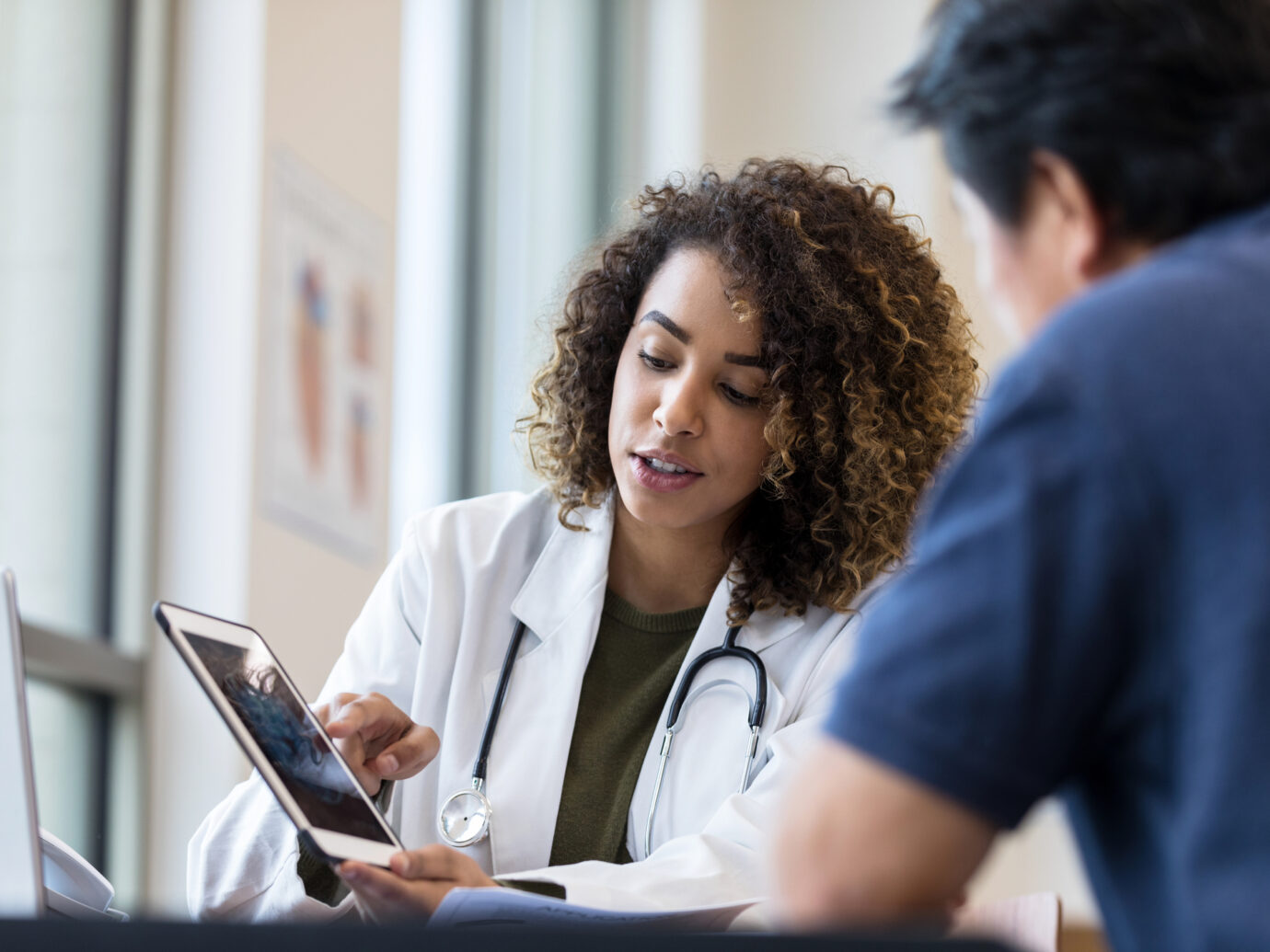 Doctor speaker with her patient