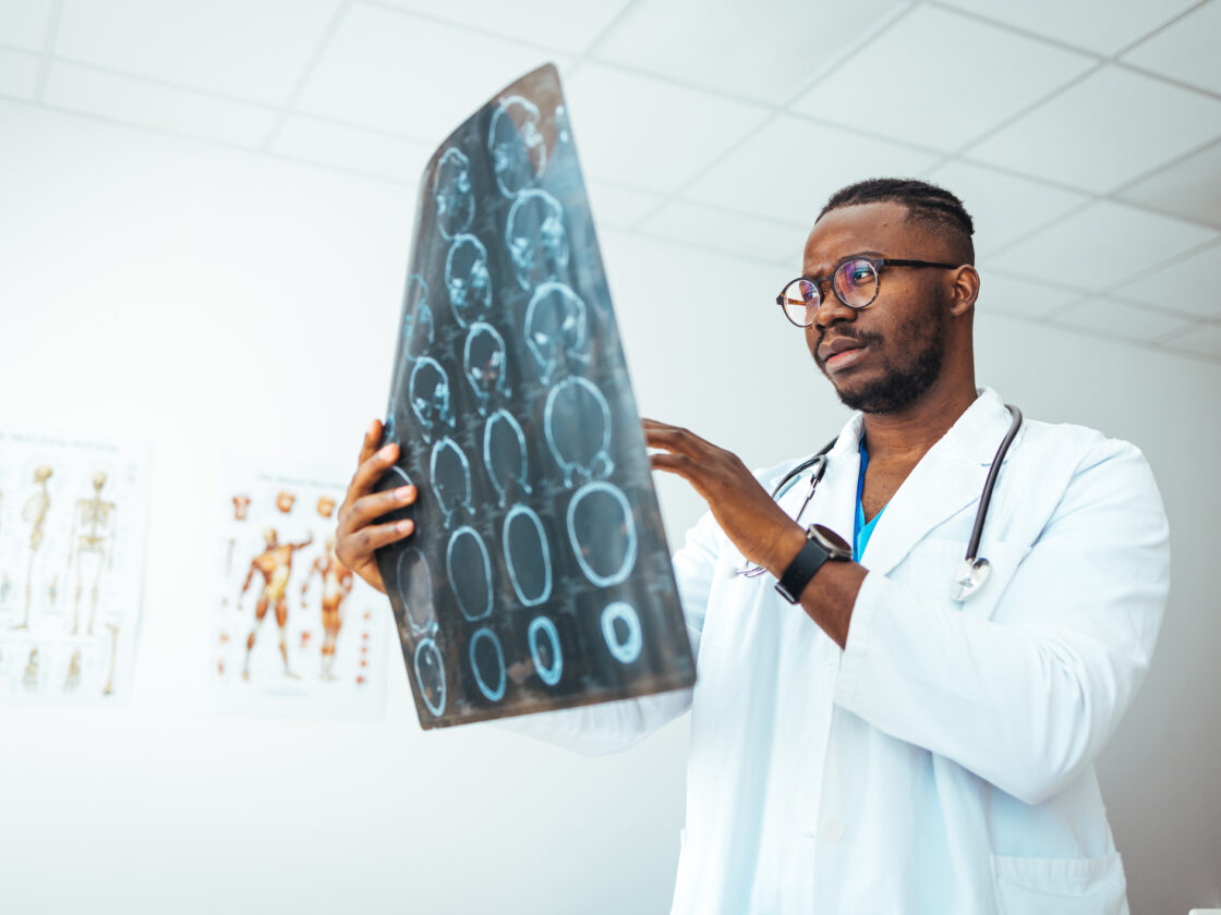 Doctors Examining X-Ray