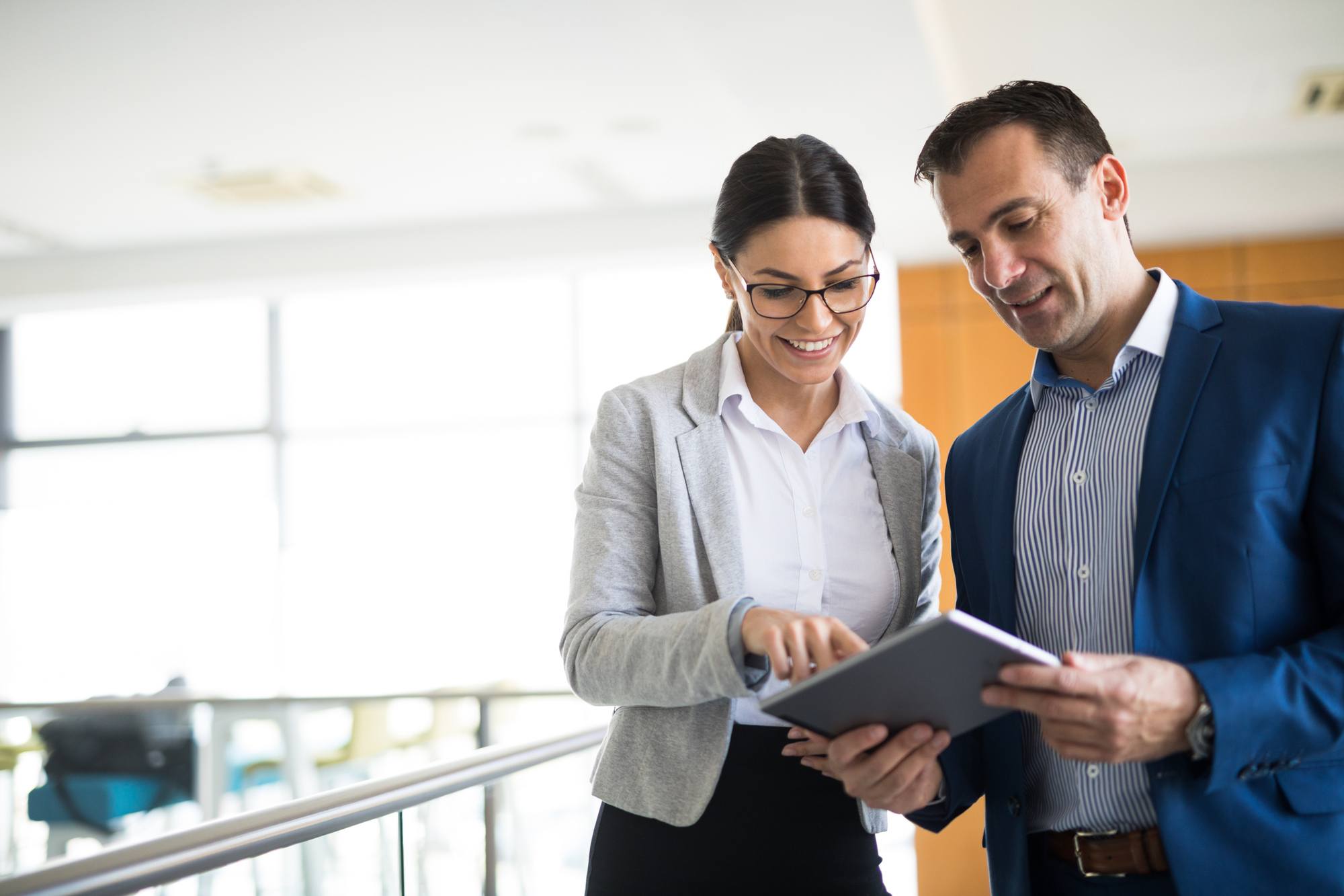 Two business people discussing business strategy