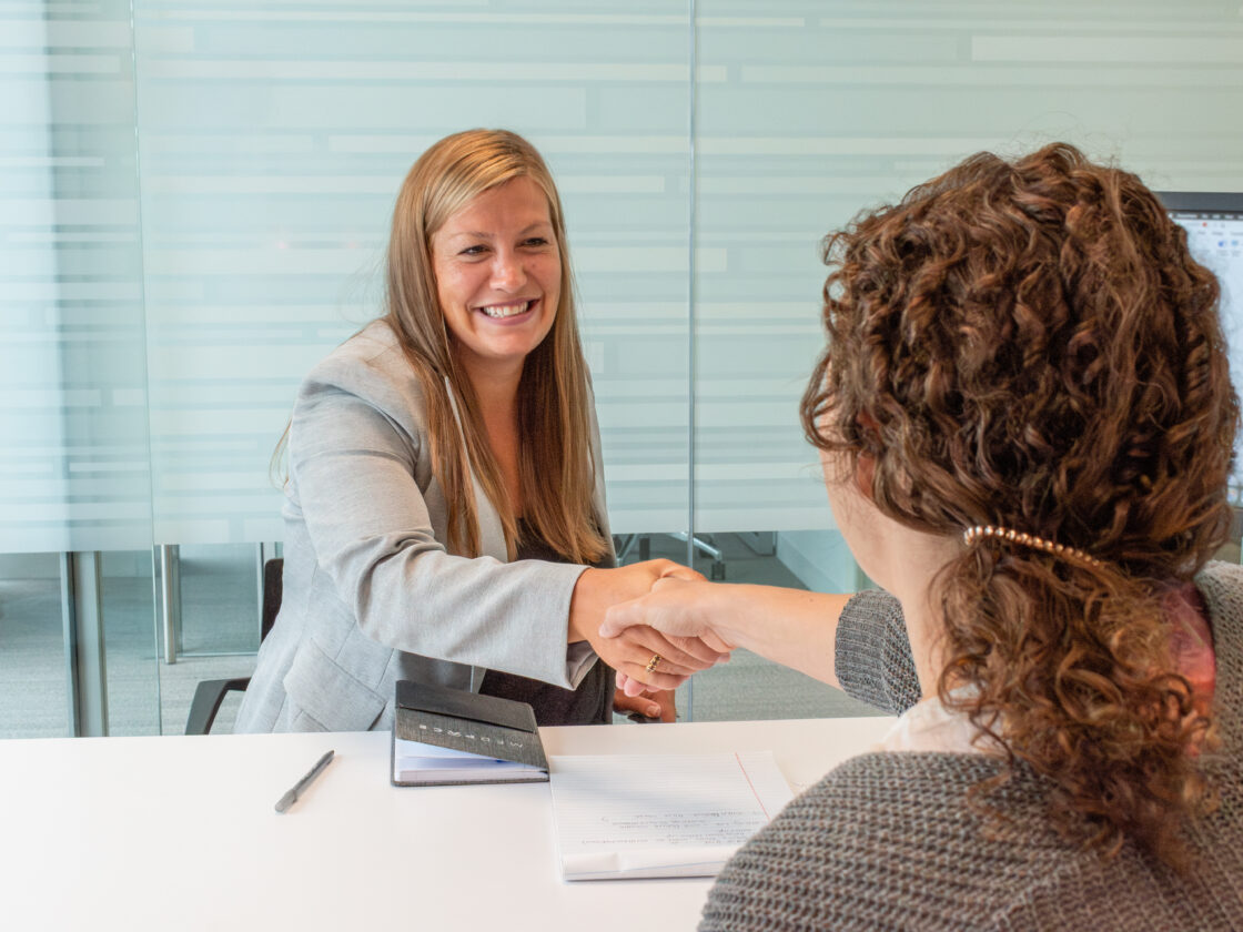 hospital executive meets with medical staff
