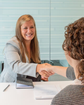 hospital executive meets with medical staff