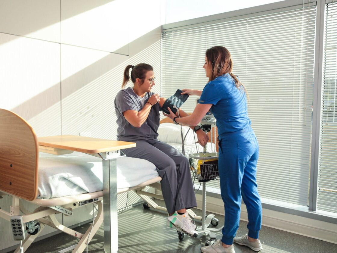 Phase I Unit Nurse Taking Blood Pressure