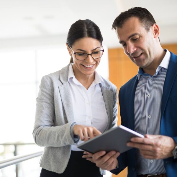 Two business people discussing business strategy